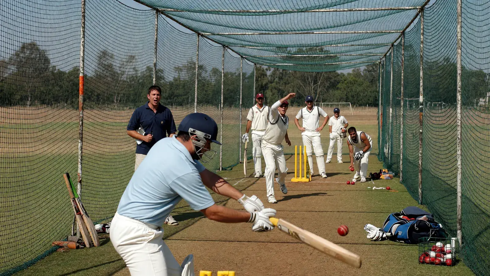 Practice nets at a coaching session, beginner context